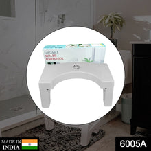 Compact and non-slip squat stool for toilet use, white color.