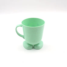 children's toothbrush holder and brushing cup with handle.